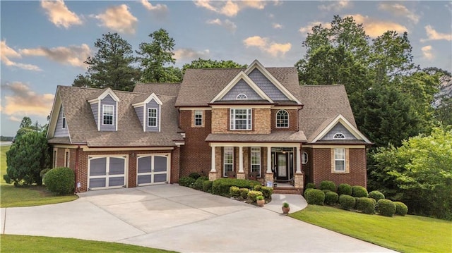 9742 Fallview Ct, Villa Rica, GA 30180 - view of front of property with a porch, driveway, brick siding, a front yard, and a garage