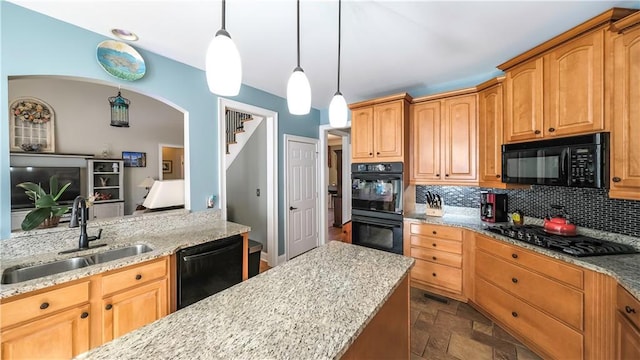 9742 Fallview Ct, Villa Rica, GA 30180 - kitchen with black appliances, a sink, light stone counters, backsplash, and dark stone finish flooring