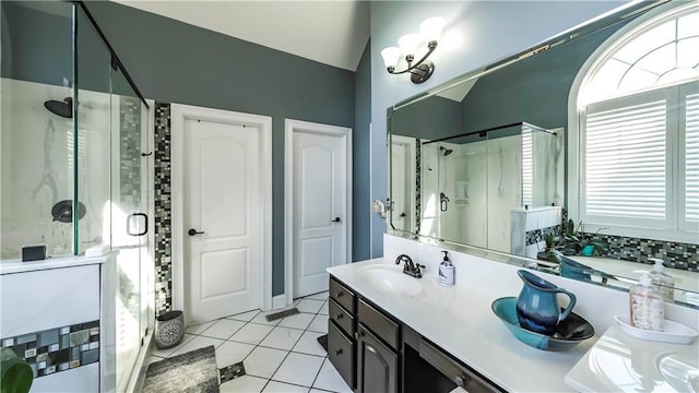 9742 Fallview Ct, Villa Rica, GA 30180 - full bath with a stall shower, double vanity, and tile patterned floors