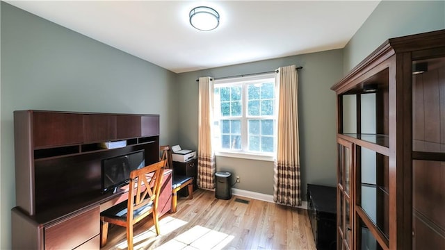 9742 Fallview Ct, Villa Rica, GA 30180 - home office featuring light wood-style floors and baseboards