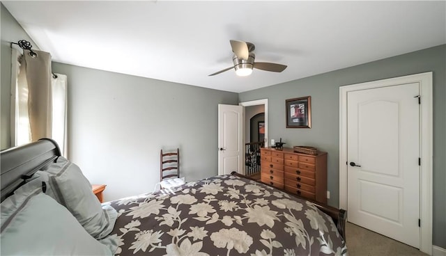 9742 Fallview Ct, Villa Rica, GA 30180 - carpeted bedroom featuring ceiling fan and arched walkways