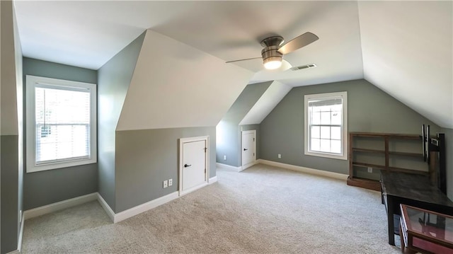 9742 Fallview Ct, Villa Rica, GA 30180 - additional living space with carpet floors, lofted ceiling, ceiling fan, and baseboards