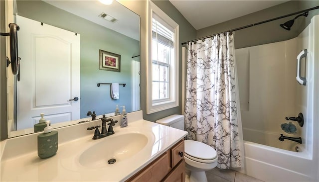9742 Fallview Ct, Villa Rica, GA 30180 - bathroom with toilet, tile patterned floors, vanity, and shower / tub combo