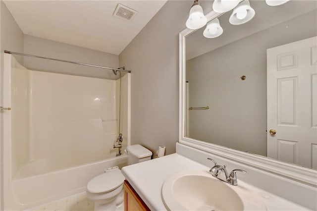 bathroom featuring toilet, visible vents, shower / washtub combination, and vanity