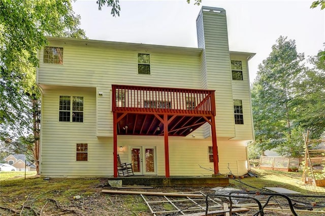 back of property featuring french doors