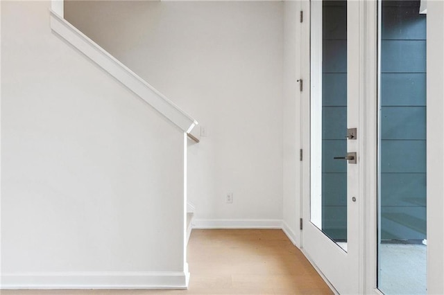 foyer entrance with wood-type flooring