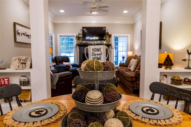living room featuring crown molding, wood finished floors, ceiling fan, and recessed lighting