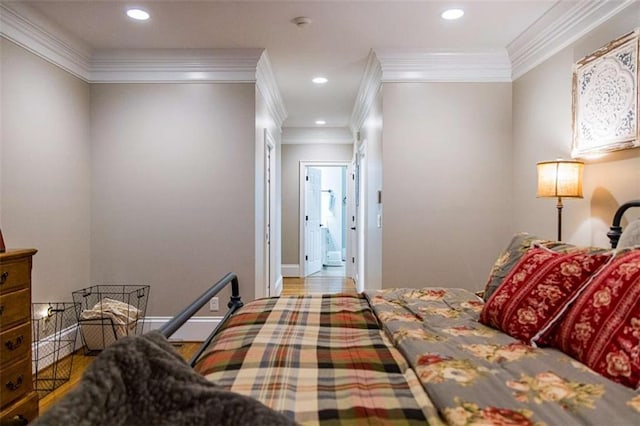 bedroom with recessed lighting, crown molding, and baseboards