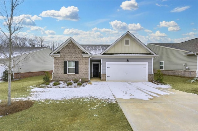 view of front of property with a garage and a front lawn