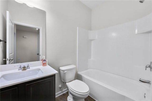 full bathroom with bathtub / shower combination, vanity, toilet, and wood-type flooring