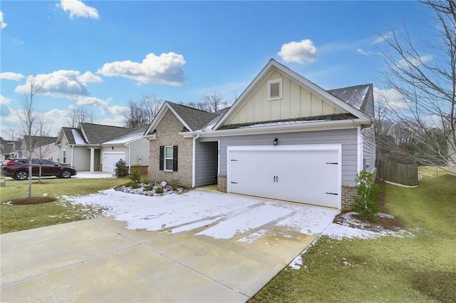 view of front of home featuring a garage and a front lawn