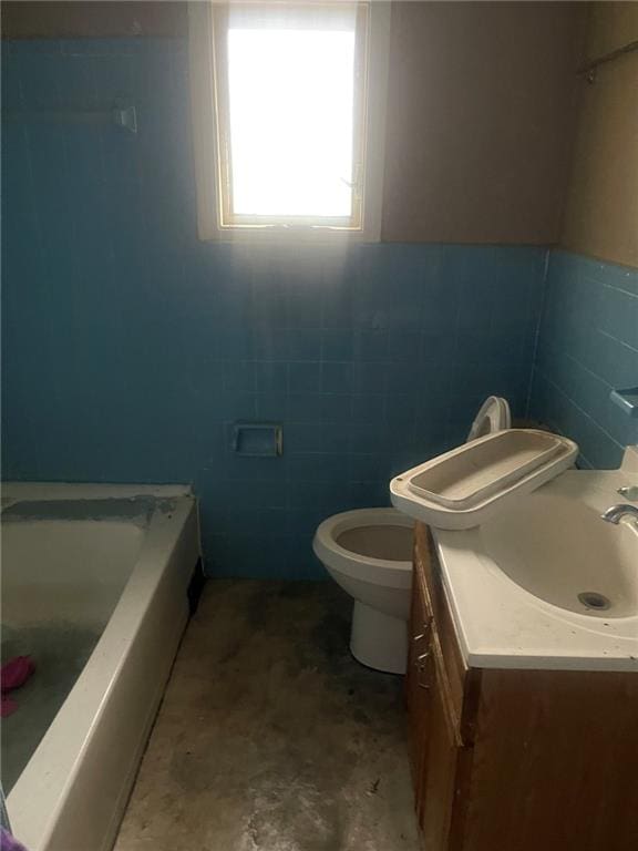 914 Bowden St, Savannah, GA 31415 - full bathroom with tile walls, a tub, toilet, vanity, and a shower