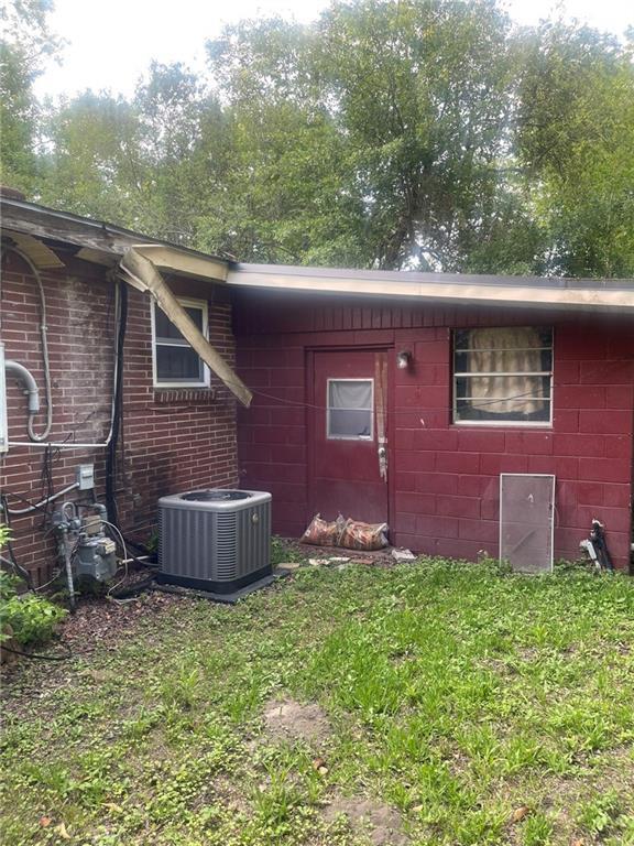 914 Bowden St, Savannah, GA 31415 - view of property exterior with central AC unit