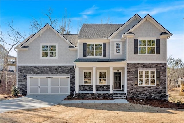 14 Grove Pointe Way SE, Cartersville, GA 30120 - craftsman-style home featuring an attached garage, stone siding, a porch, and concrete driveway