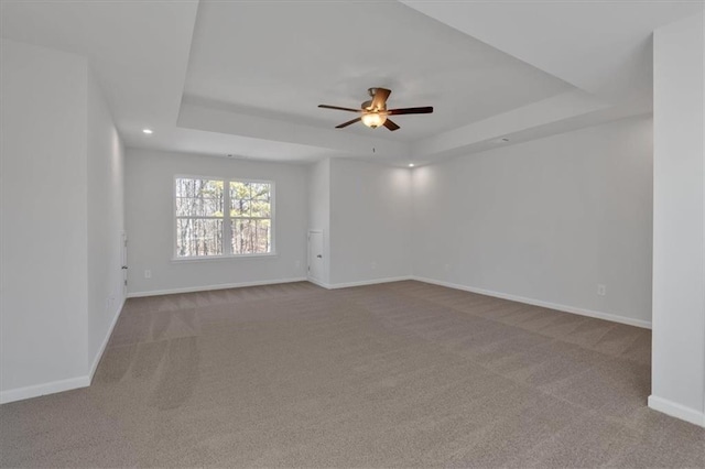 14 Grove Pointe Way SE, Cartersville, GA 30120 - empty room featuring carpet floors, baseboards, a tray ceiling, and recessed lighting