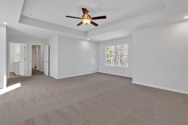 14 Grove Pointe Way SE, Cartersville, GA 30120 - carpeted spare room with a ceiling fan, recessed lighting, a raised ceiling, and baseboards