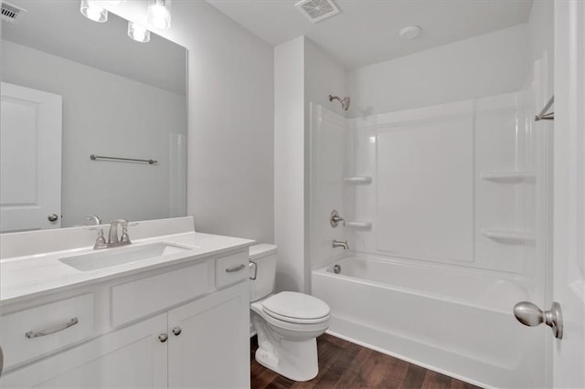 14 Grove Pointe Way SE, Cartersville, GA 30120 - bathroom featuring shower / bathtub combination, toilet, wood finished floors, vanity, and visible vents