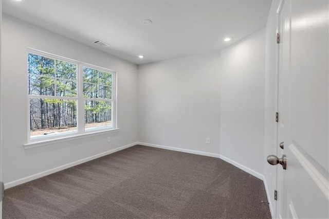 14 Grove Pointe Way SE, Cartersville, GA 30120 - empty room featuring dark colored carpet, visible vents, baseboards, and recessed lighting