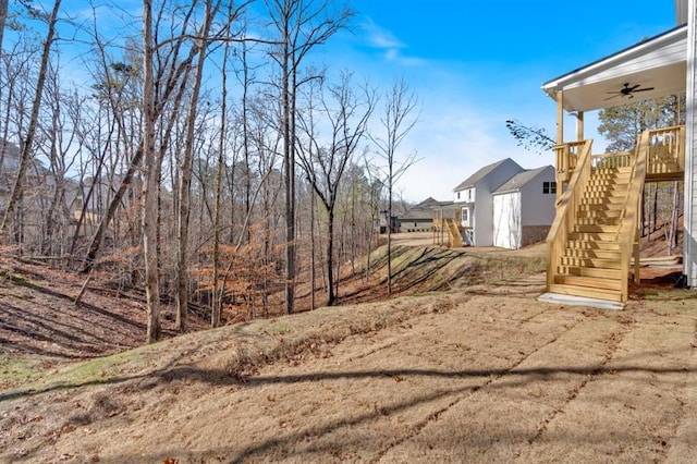 14 Grove Pointe Way SE, Cartersville, GA 30120 - view of yard with a ceiling fan and stairway