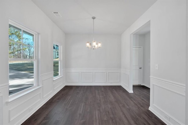 14 Grove Pointe Way SE, Cartersville, GA 30120 - unfurnished dining area featuring a chandelier, a wainscoted wall, visible vents, and dark wood-style floors