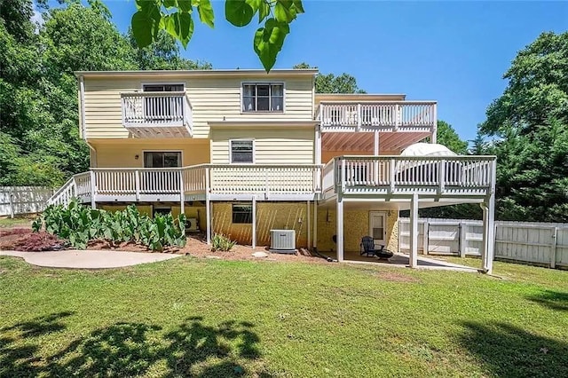 1202 Laurel Cliff Dr SE, Smyrna, GA 30082 - rear view of property with a balcony, a patio, a wooden deck, and central AC unit