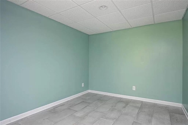 1202 Laurel Cliff Dr SE, Smyrna, GA 30082 - unfurnished room featuring baseboards and a paneled ceiling