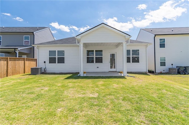 2010 Vidalia Ct, Dacula, GA 30019 - back of house with a patio and central air condition unit
