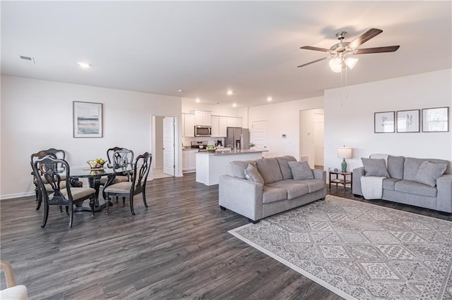 2010 Vidalia Ct, Dacula, GA 30019 - living room featuring dark wood-style flooring, ceiling fan, recessed lighting, and baseboards