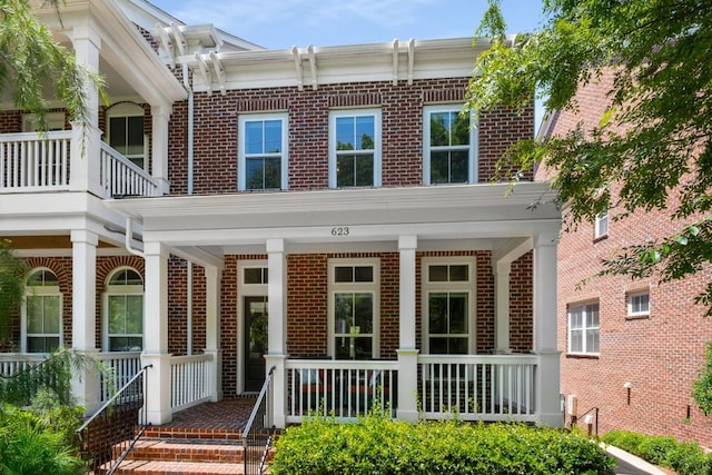 623 Brennan Dr, Decatur, GA 30033 - doorway to property with brick siding and a porch