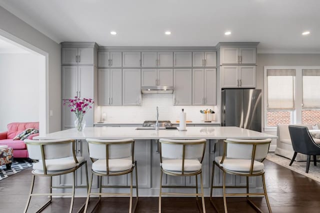 623 Brennan Dr, Decatur, GA 30033 - kitchen with gray cabinets, freestanding refrigerator, a sink, light countertops, and recessed lighting