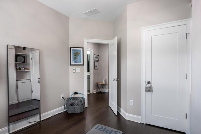 623 Brennan Dr, Decatur, GA 30033 - corridor with dark wood-style flooring and baseboards