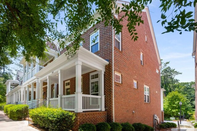 623 Brennan Dr, Decatur, GA 30033 - view of home's exterior with brick siding and covered porch