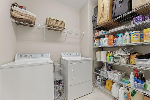 laundry area with independent washer and dryer