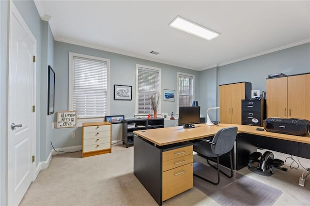 office area with light colored carpet, crown molding, and baseboards