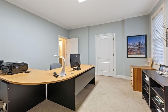 office space with light carpet, crown molding, and baseboards