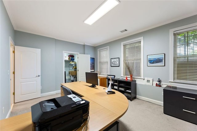 office with light colored carpet, crown molding, and baseboards