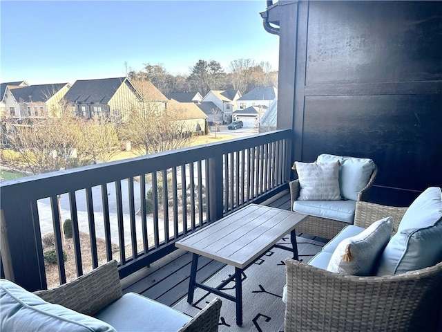 balcony featuring a residential view and outdoor lounge area