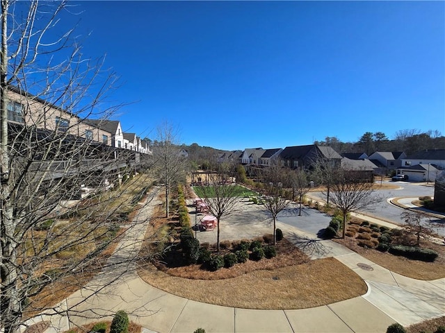 view of yard featuring a residential view