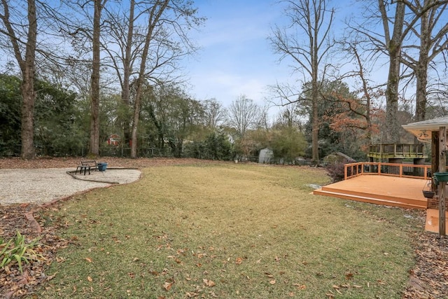 view of yard with a deck