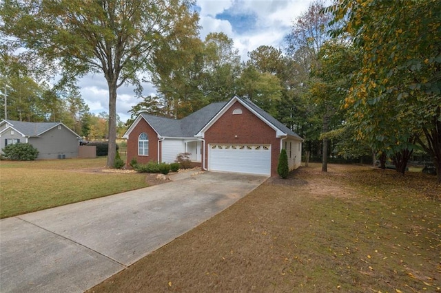 ranch-style home with a front lawn and a garage