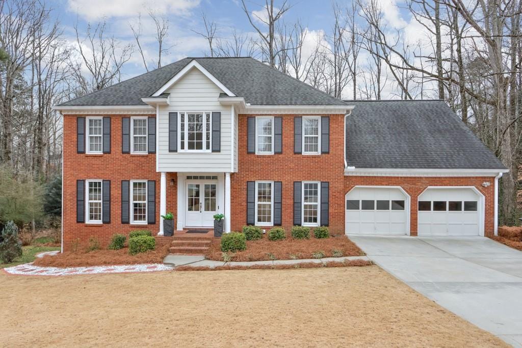 colonial-style house with a garage