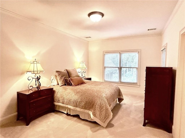 bedroom with light carpet, visible vents, and ornamental molding