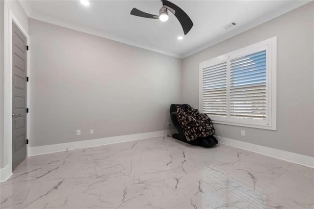 spare room featuring visible vents, marble finish floor, crown molding, and baseboards