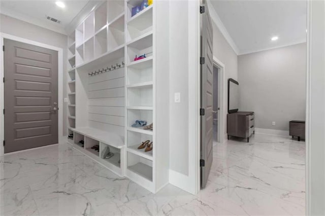 mudroom featuring recessed lighting, visible vents, marble finish floor, and crown molding