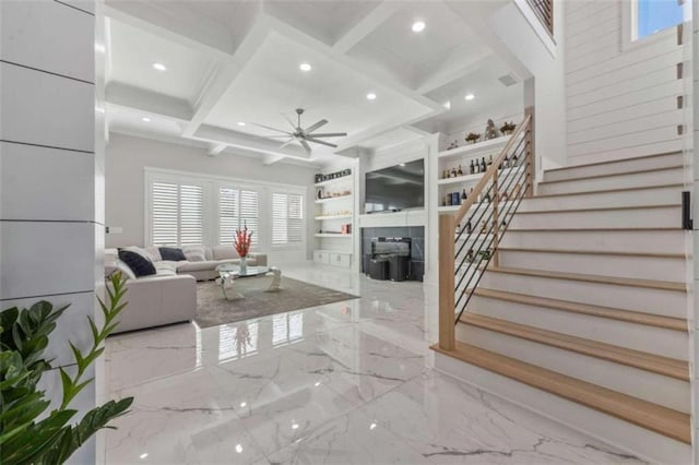 living room featuring marble finish floor, coffered ceiling, recessed lighting, stairway, and ceiling fan