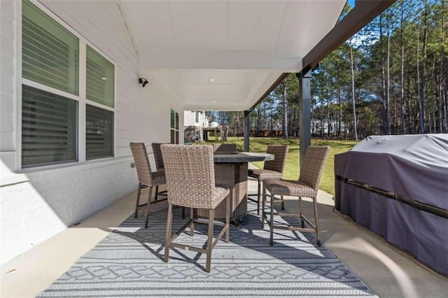 view of patio featuring outdoor dining space