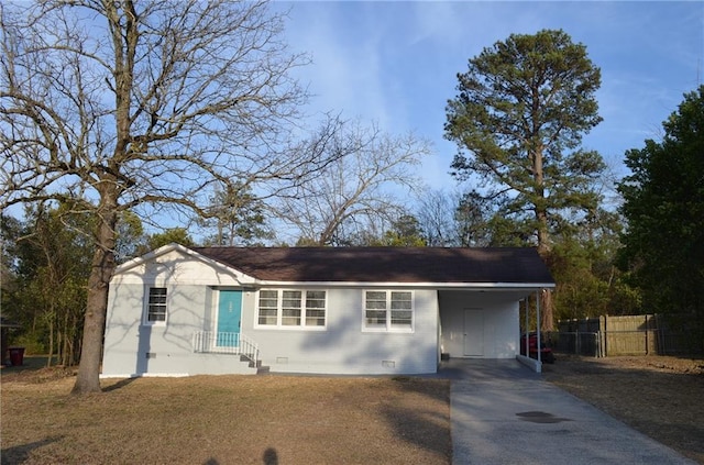 4940 Pinefield Dr, Macon, GA 31206 - ranch-style home featuring concrete driveway and a carport