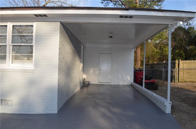 4940 Pinefield Dr, Macon, GA 31206 - view of parking / parking lot featuring a carport