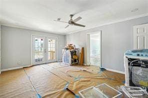 unfurnished living room with french doors and ceiling fan