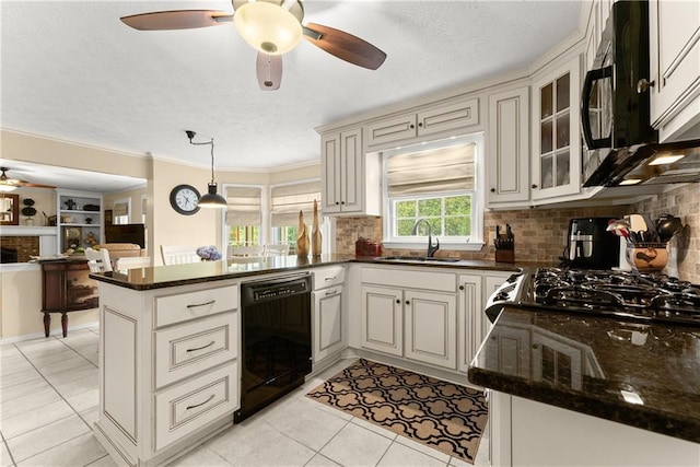 1083 Wash Lee Dr SW, Lilburn, GA 30047 - kitchen featuring dishwasher, ceiling fan, a peninsula, light tile patterned flooring, and tasteful backsplash